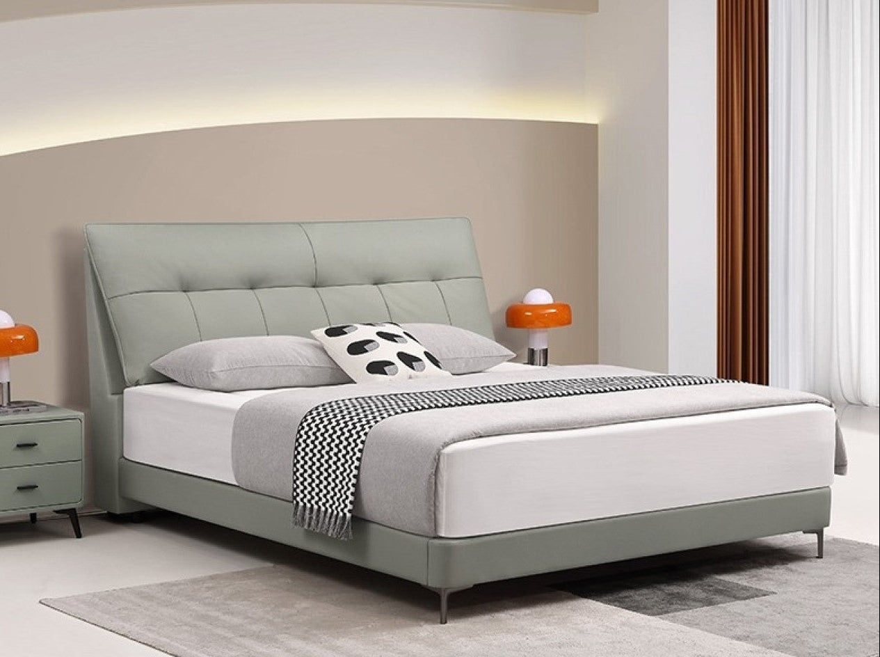 Minimalist Upholstered Bed with Cowhide Headboard and Elevated Metal Legs